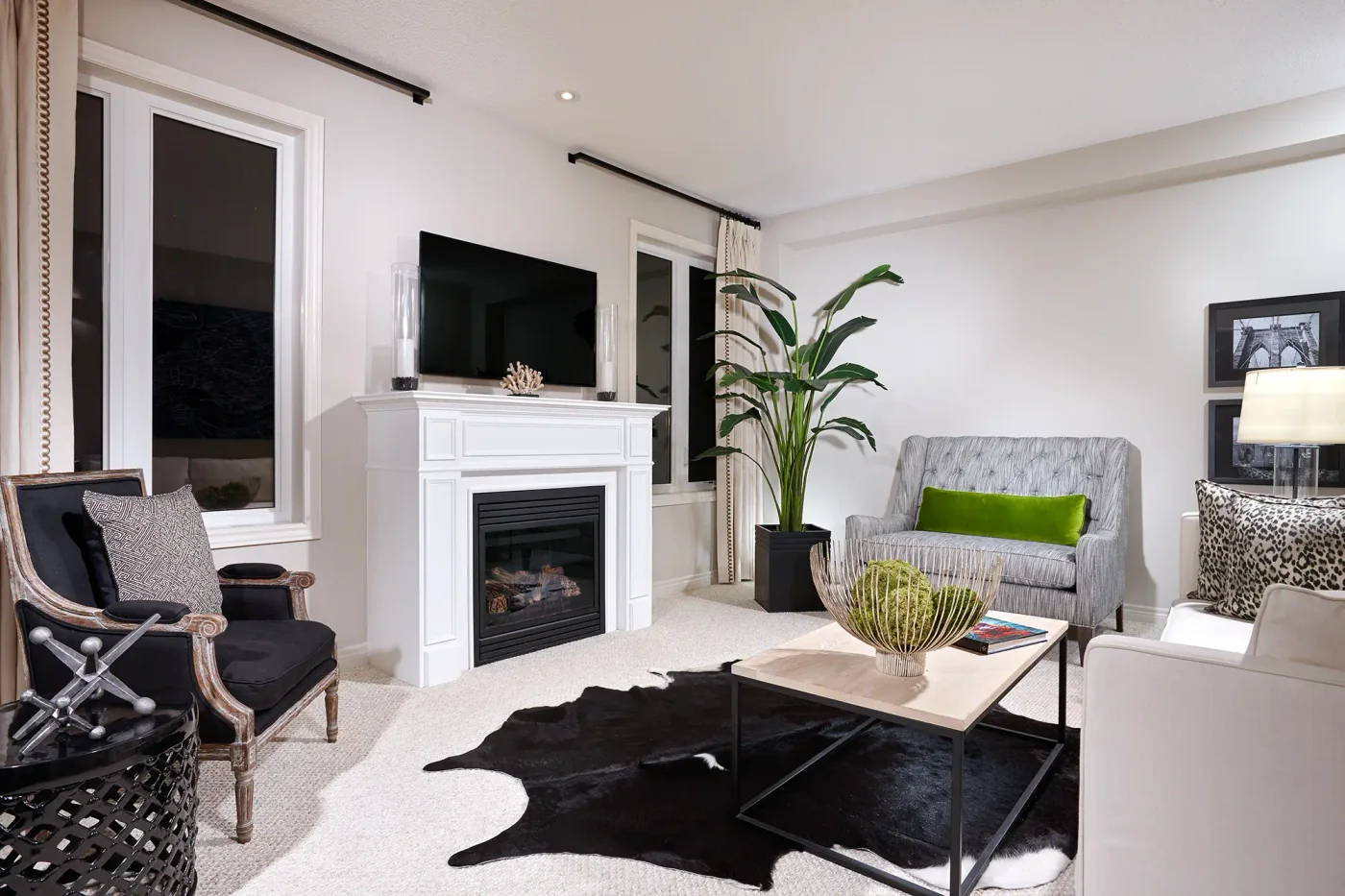 Rosehaven interior marketing photograph showing a furnished living room with a fireplace