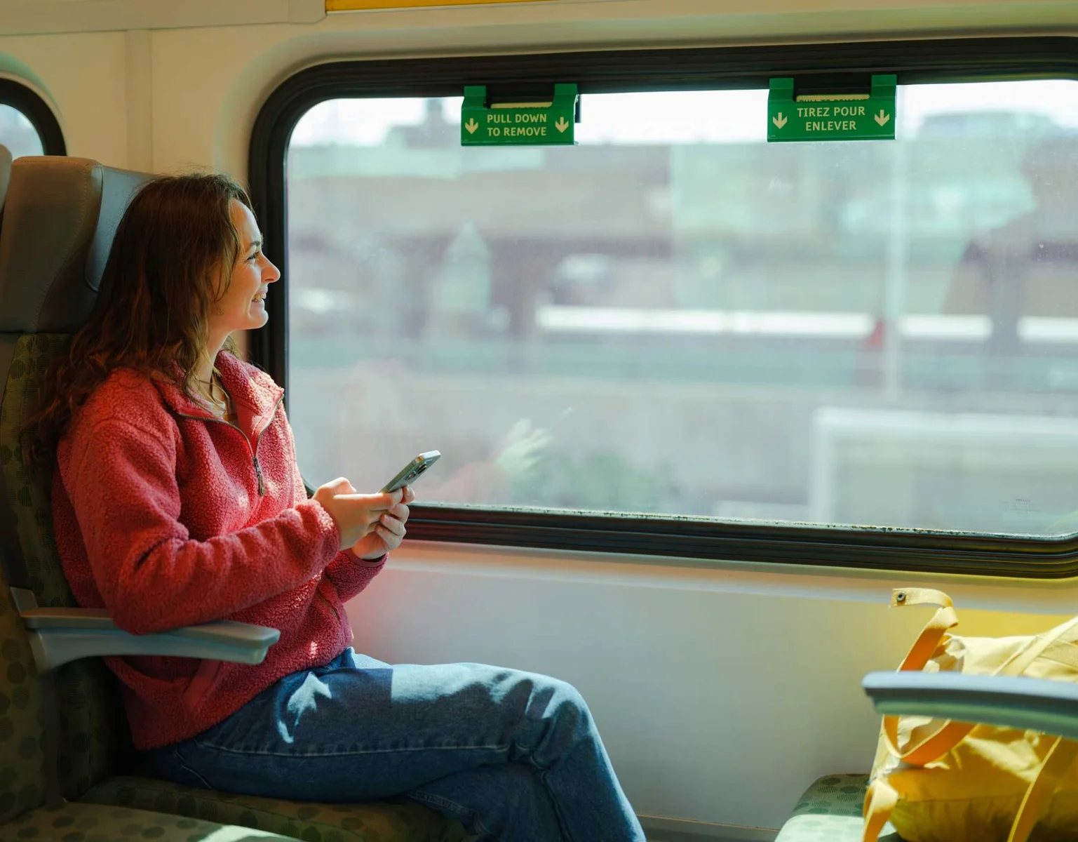 Builder lifestyle photograph of a passenger travelling by train