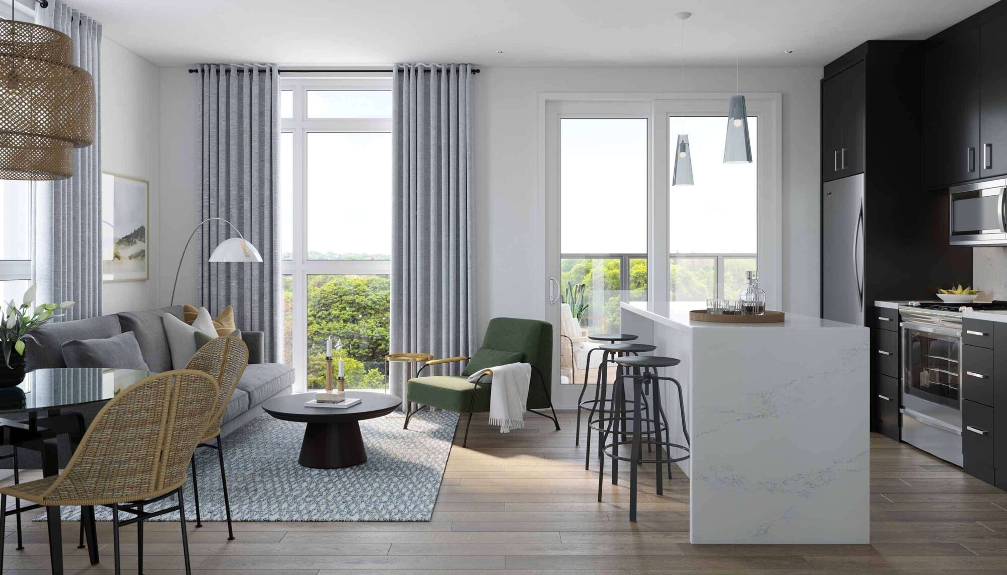 A bright open-plan living and dining room with a kitchen to one side.