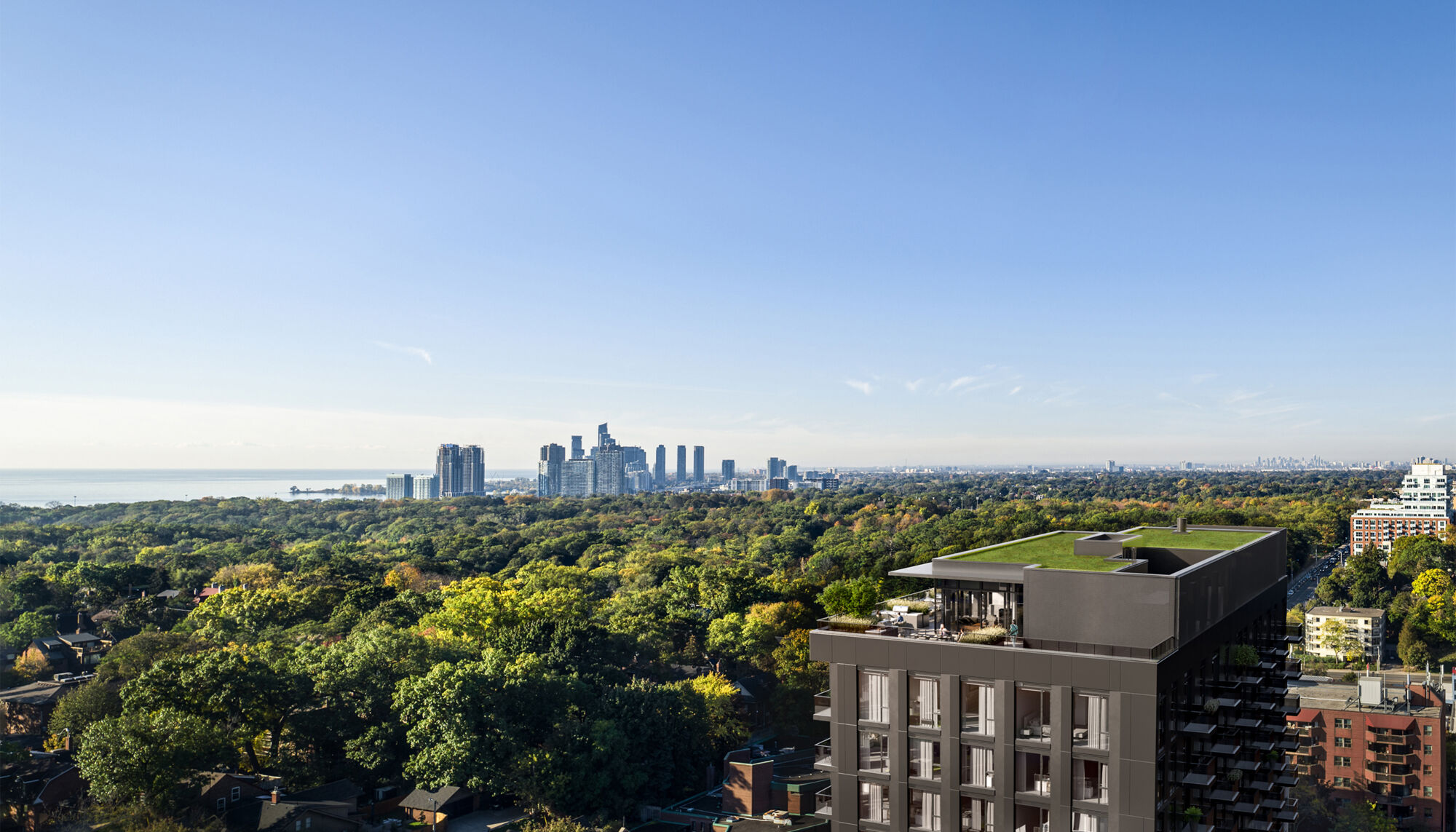 Builder promotional aerial view across Westbend toward High Park and Toronto’s skyline.